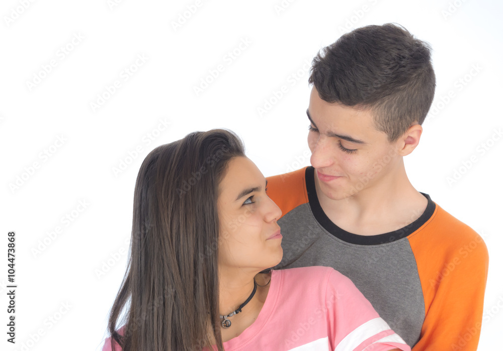 Funny teen couple, smiling newly wake up and dressed in their p Funny teen couple, smiling newly wake up and dressed in their p