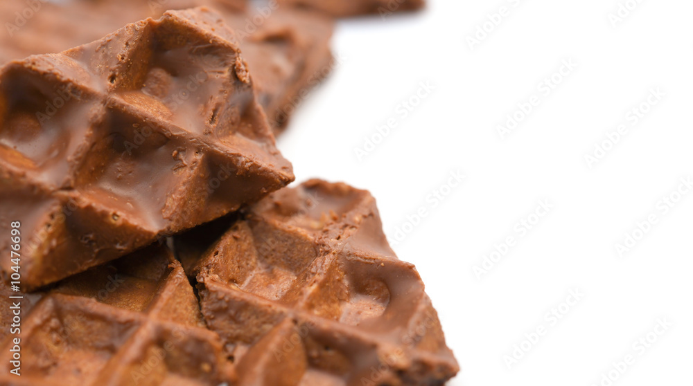 chocolate blocks on a white background with copy space chocolate blocks on a white background with copy space