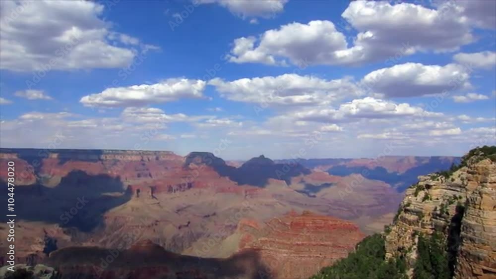 A gorgeous panning time lapse shot of the Grand Canyon with clouds. A gorgeous panning time lapse shot of the Grand Canyon with clouds.