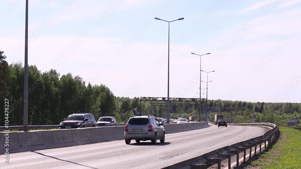 Route to truck driving through and traffic in summer sunny day Route to truck driving through and traffic in summer sunny day
