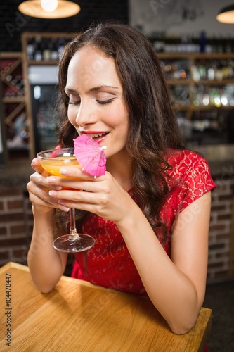 Pretty woman having a cocktail