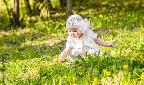 Cute smiling baby girl outdoors