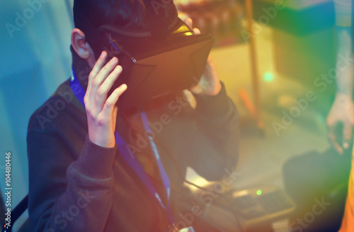 Boy using oculus rift headset