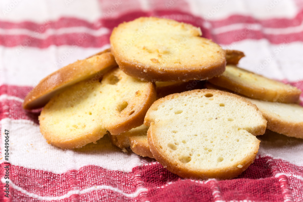 Crispy toast breads with cheese in macro view Crispy toast breads with cheese in macro view