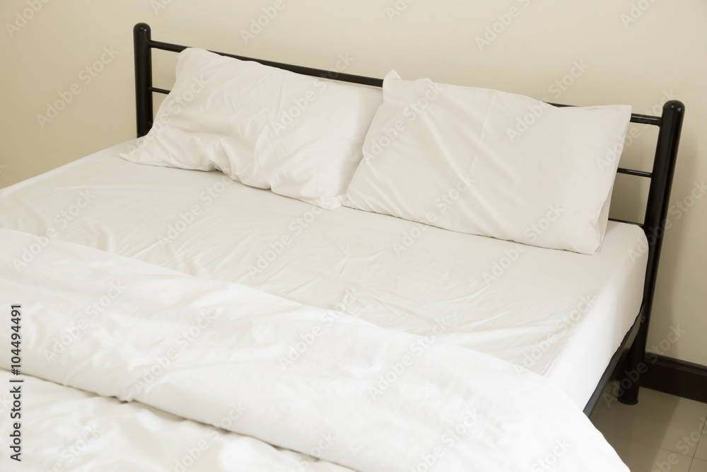 White bed sheets and pillows White bed sheets and pillows
