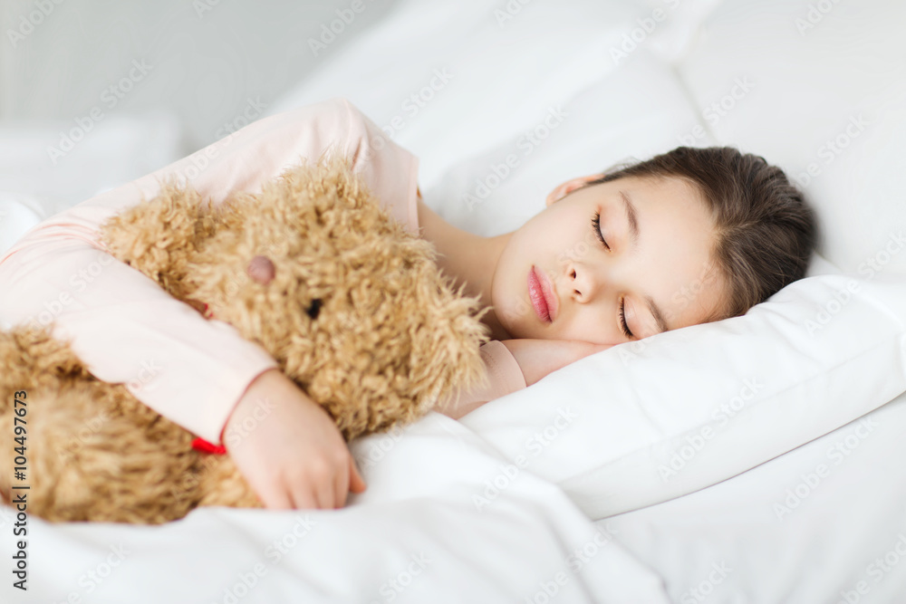 girl sleeping with teddy bear toy in bed at home girl sleeping with teddy bear toy in bed at home
