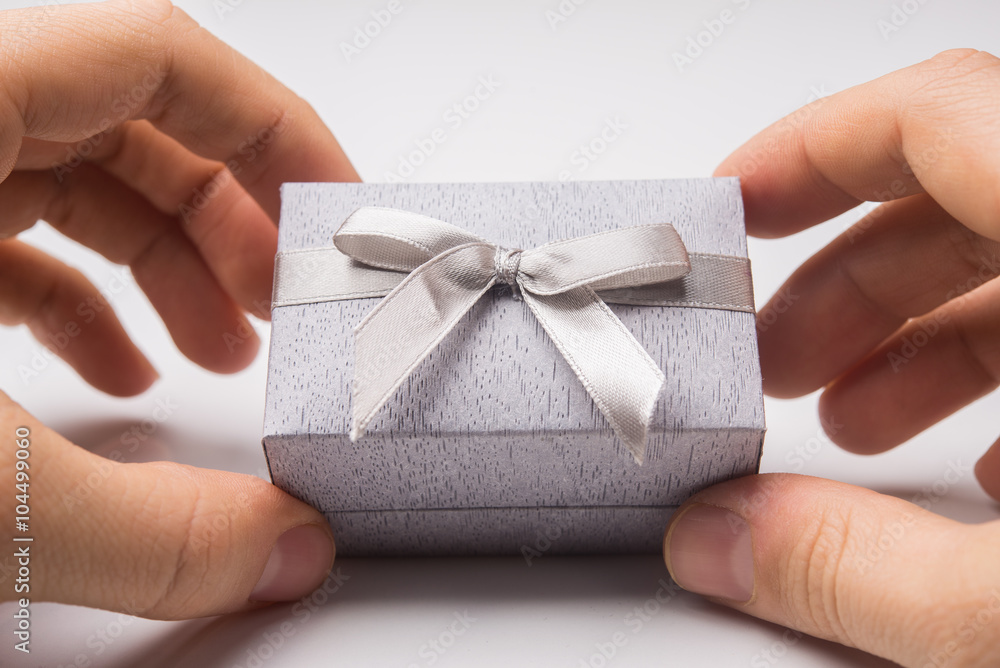 Man holding gift box on white background Man holding gift box on white background