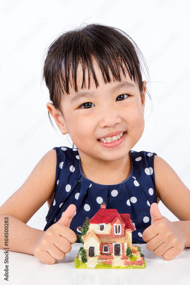 Asian Little Chinese Girl With Toy House for Property Concept