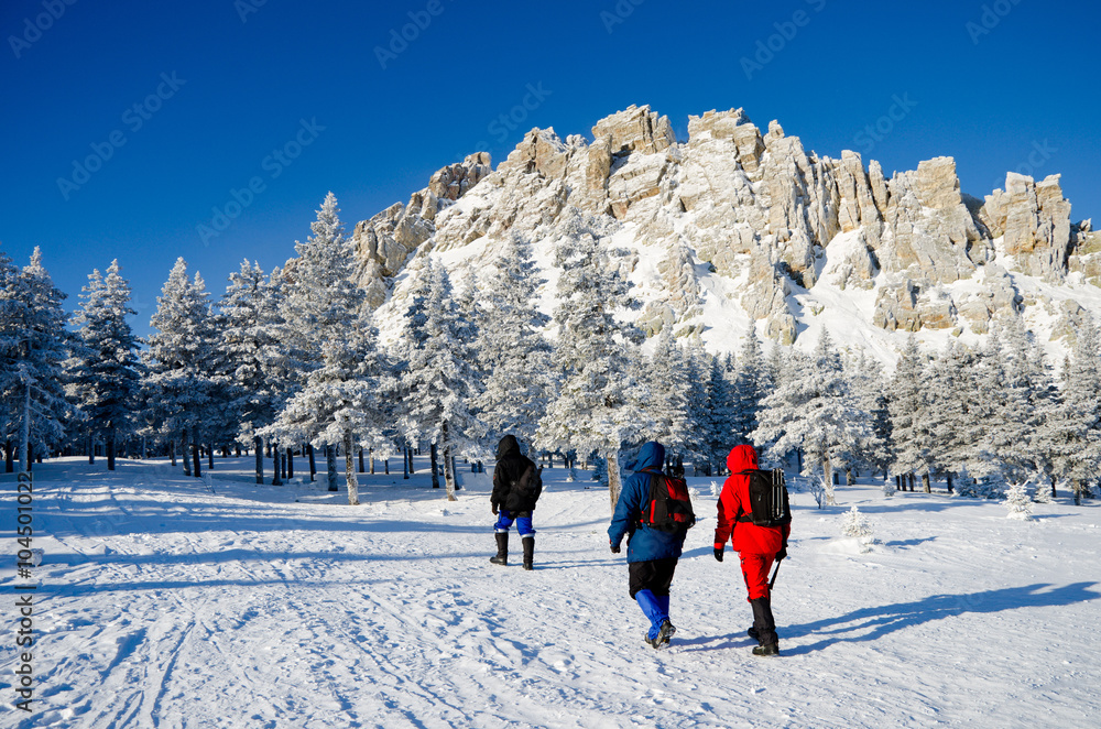 Tourists in the Ural mountains in winter 