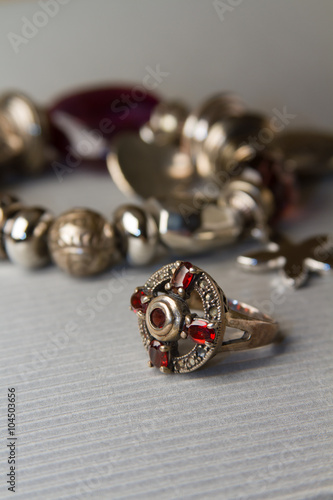bracelet and vintage ring with a red stone