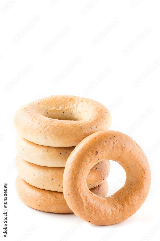 Few fresh bagels on white background Few fresh bagels on white background