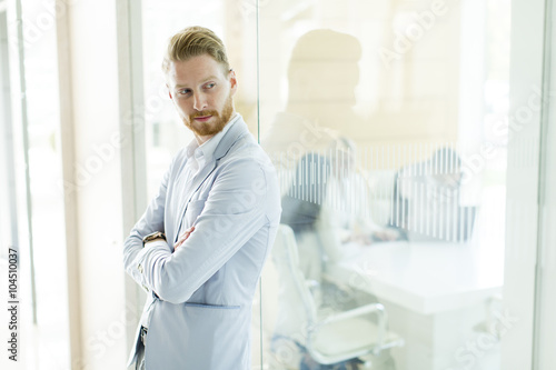 Modern young businessman in...