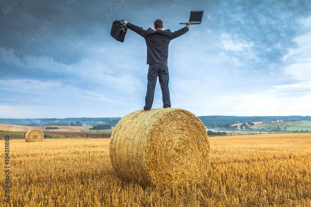 Contemporary businessman farmer in the landscape Contemporary businessman farmer in the landscape