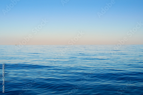 Sea waves on a background of blue sky