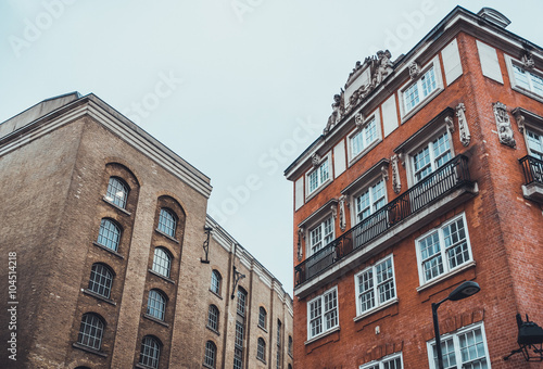 Old Buildings in Industrial Area with Gray Sky