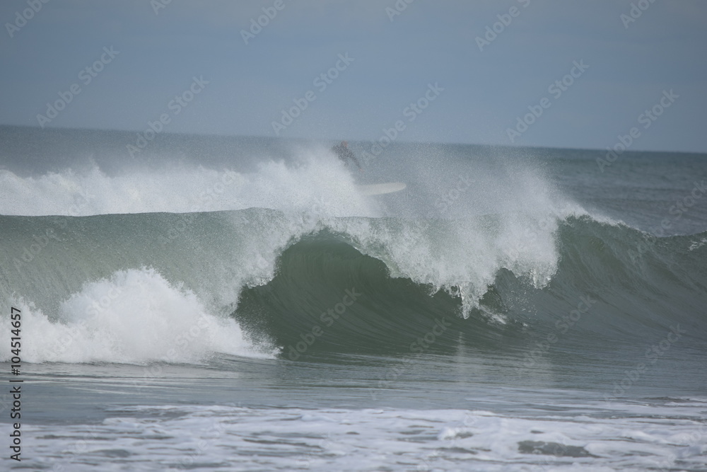 Perfect Wave Breaks as Surfer Snabs Outer Break