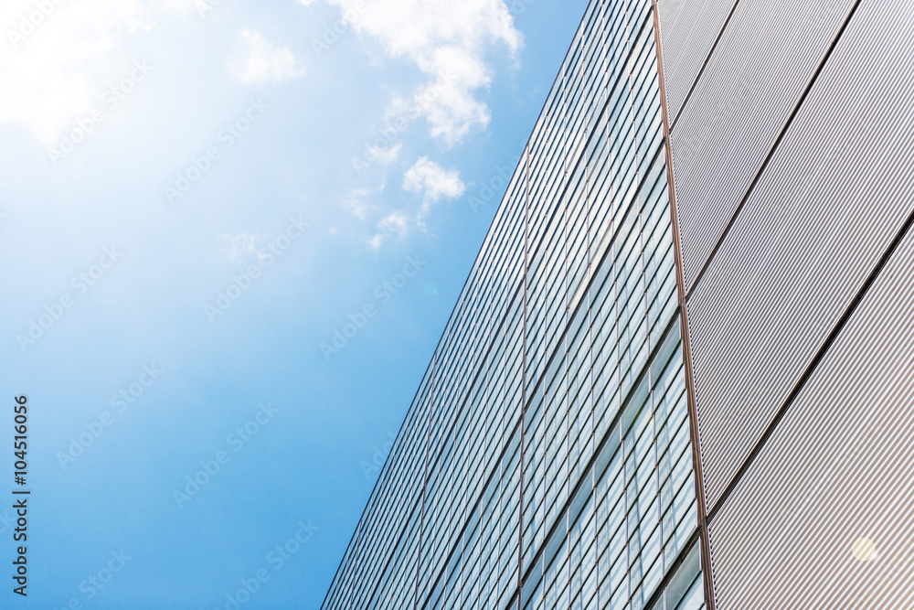 Modern office building with illumination coming from the left. Useful file for your business site, annual report or other electronic or printed media. Modern office building with illumination coming from the left. Useful file for your business site, annual report or other electronic or printed media.