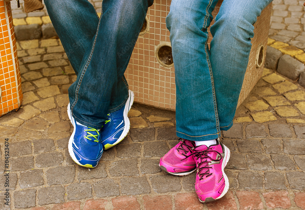 Male and female's feet with shoes Male and female's feet with shoes