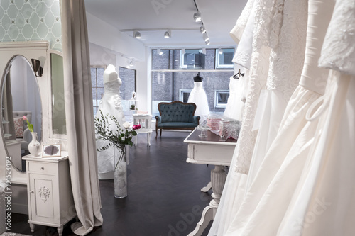 Billede på lærred interior bridal shop, wedding store, shop window, view from changing area