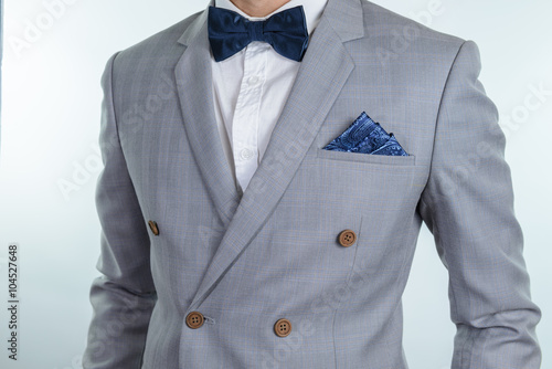 grey suit plaid texture, bowtie, pocket square