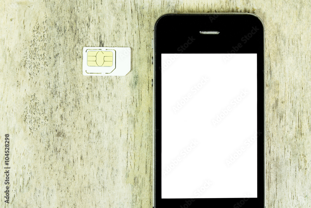 smart phone and sim card on wood background, top view smart phone and sim card on wood background, top view