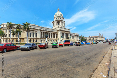 Photography The Capitol building and heavy traffic of city center,  Havana