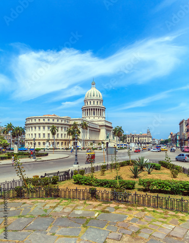 The Capitol building and heavy traffic of city center, Havana