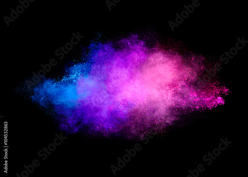 Colorful Dust Particle Explosion Isolated on Black Background © Casther