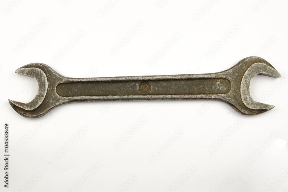 Tools isolated against a white background. Spanner on a white background. wrench on a white background. steel open-ended spanner isolated on white background Tools isolated against a white background. Spanner on a white background. wrench on a white background. steel open-ended spanner isolated on white background