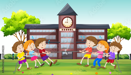 Children playing tug of war at school