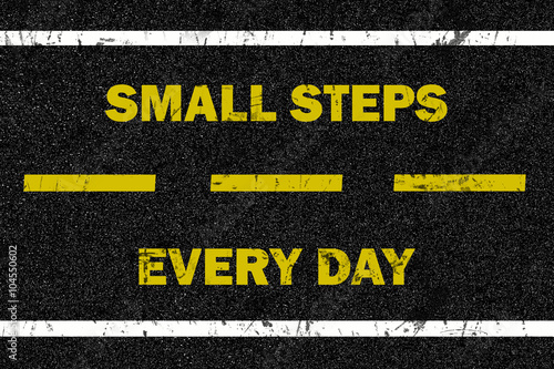 Small steps every day word on the road background