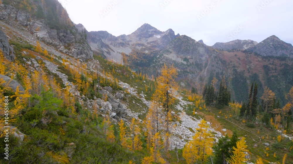 Beautiful rocky mountains. Sharp peaks of rocky mountains. Rocky mountain slopes. Fir forest in the mountains in autumn. 4K, 3840*2160, high bit rate, UHD Beautiful rocky mountains. Sharp peaks of rocky mountains. Rocky mountain slopes. Fir forest in the mountains in autumn. 4K, 3840*2160, high bit rate, UHD