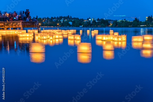 Принти на полотні lantern floating on green lake park for memorial of Hiroshima,Seattle,Washington,usa