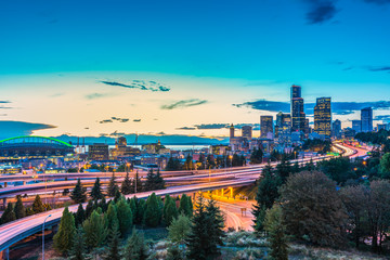 Seattle skylines and Interstate freeways converge with Elliott Bay,Seattle,Washington,usa.