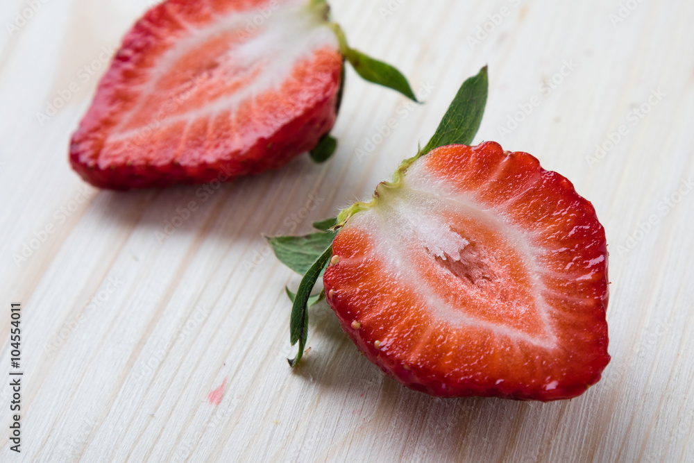 strawberries on wooden table strawberries on wooden table