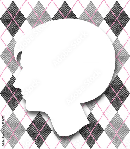 Close-up of a young woman profile silhouette on lozenge fabric background