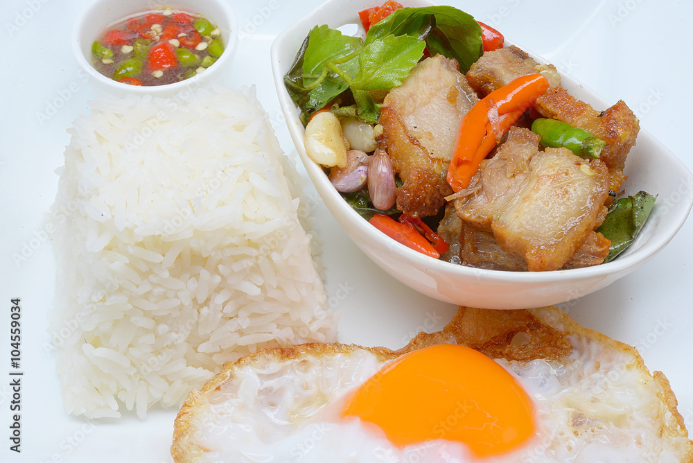 Rice topped with stir-fried pork and basil
Rice topped with stir-fried pork and basil