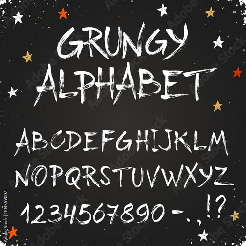 Hand drawn dry brush alphabet. Uppercase grunge letters and numbers on chalkboard. Handdrawn typography. Modern font.