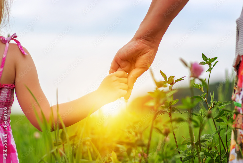 Hands of mother and daughter Hands of mother and daughter