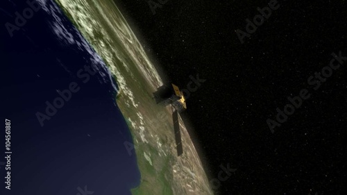 NASA animation of the Landsat satellite flying by. photo