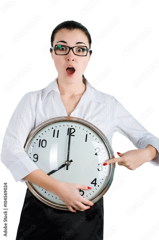 Alarmed, shocked business woman holding a large clock. White isolated background Alarmed, shocked business woman holding a large clock. White isolated background