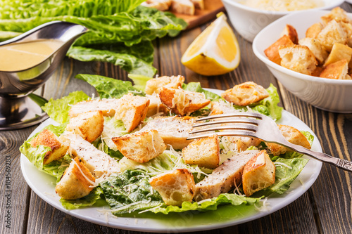 Homemade Chicken Caesar Salad with Cheese and Croutons.