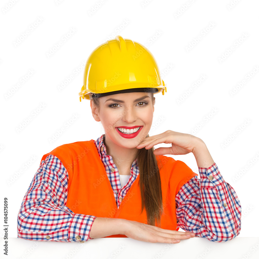 Smiling Constuction Worker Posing With Hand On Chin Smiling Constuction Worker Posing With Hand On Chin