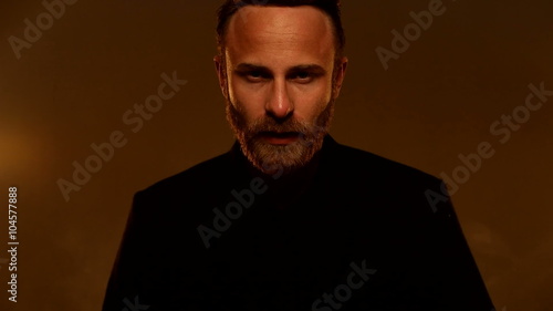 handsome fashion model man portrait looking at the camera 