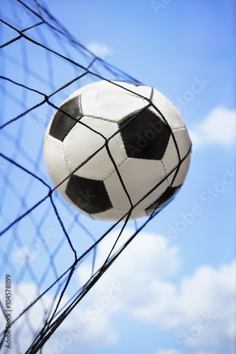 Soccer ball in back of the goal net © Brian Jackson