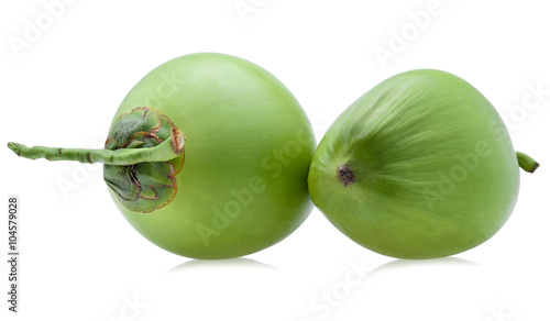 Green coconut fruit on white