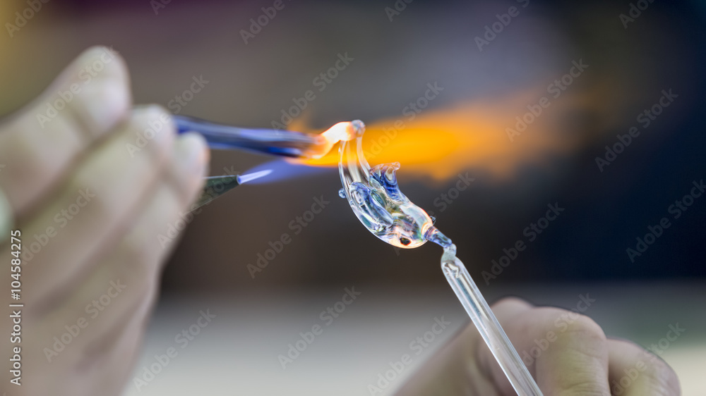 Glassblowing artisan at work Glassblowing artisan at work