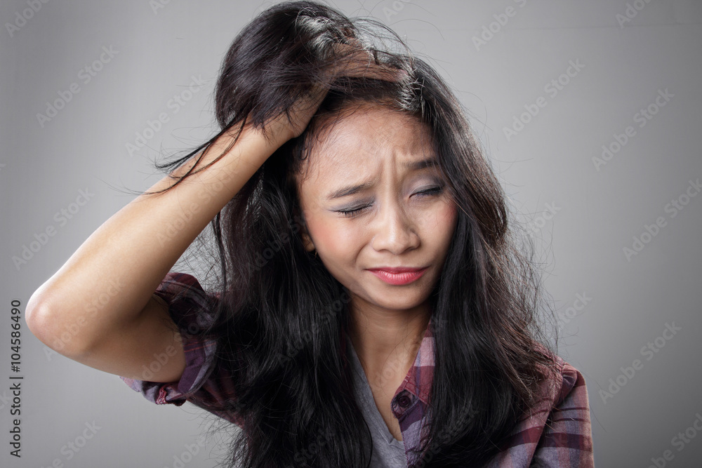 Young woman having migraine Young woman having migraine