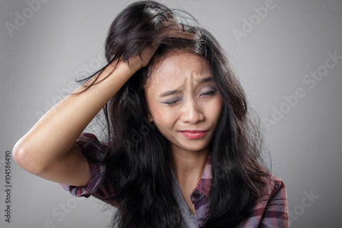 Young woman having migraine