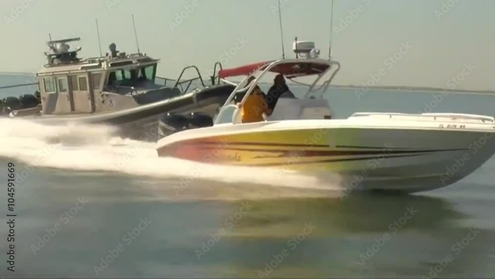 The U.S. Customs and Border Protection uses high speed boats to chases an evading speedboat.